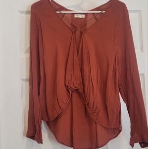 Low neck orange shirt